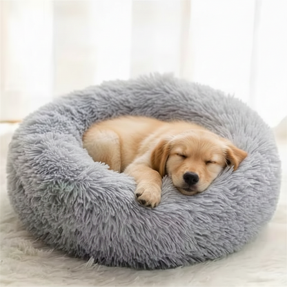 Grey calming donut pet bed with cat