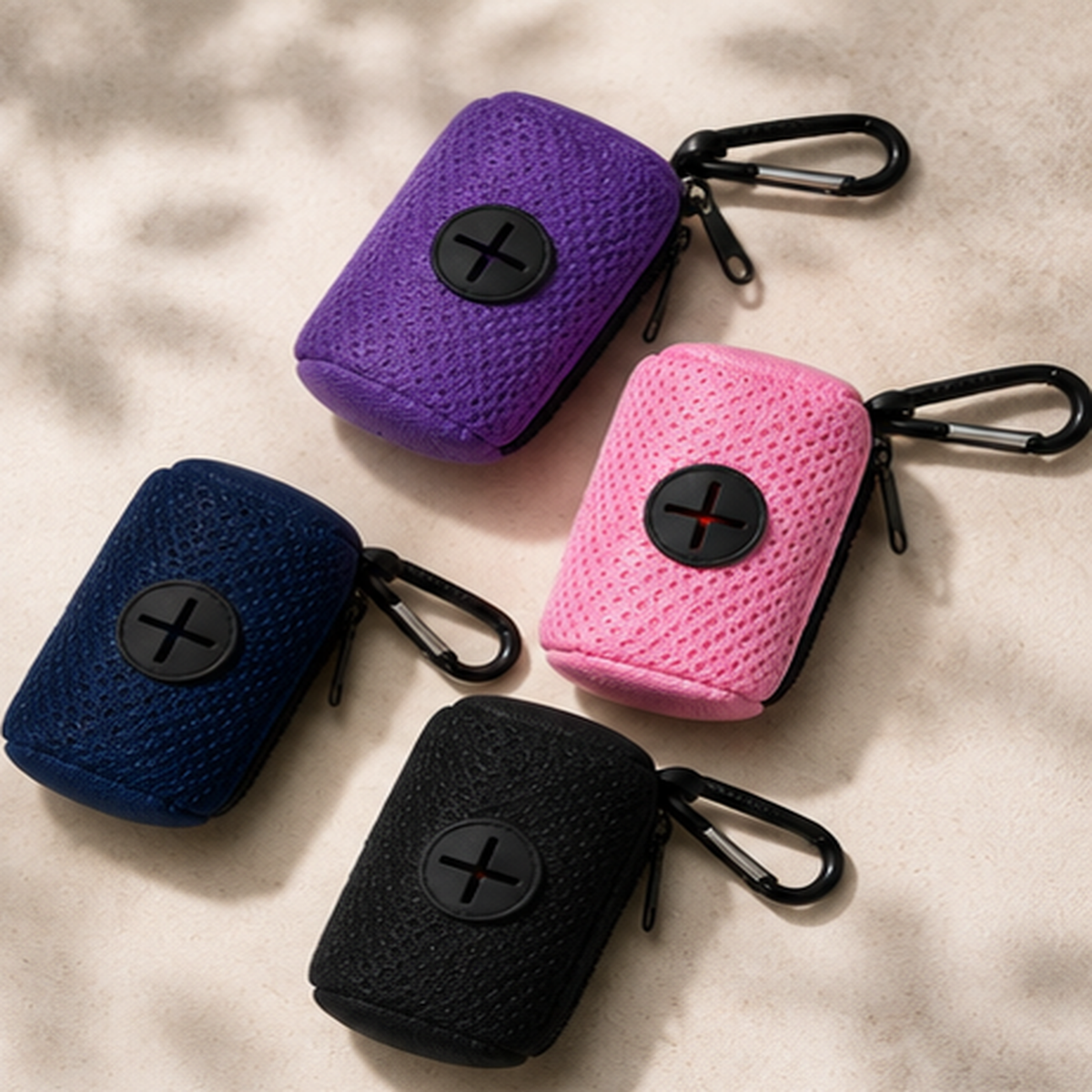 Clip-on dog waste bag dispensers in pink purple navy and black